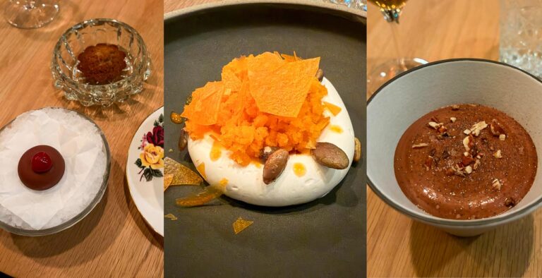 à gauche, les mignardises — une bouchée glacée enrobée de chocolat posée sur glace, accompagnée d’un petit financier doré — au centre, le dessert à l’argousier, une chantilly blanche coiffée d’un granité et d’éclats carotte–argousier vivement orangés, parsemée de graines de courge; à droite, une mousse chocolat-café onctueuse, servie dans un bol sobre et garnie de pacanes croquantes.